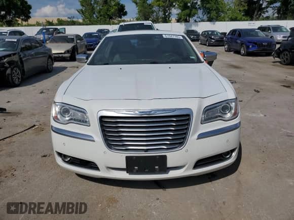 2012 Chrysler 300 C Luxury Series с VIN 2C3CCAPT1CH227776, выставлен на аукционе Copart как лот 61947785 с пробегом 197 737 миль миль и Списание • Salvage title. История ставок и продаж доступна на DreamBid. Изображение 5.