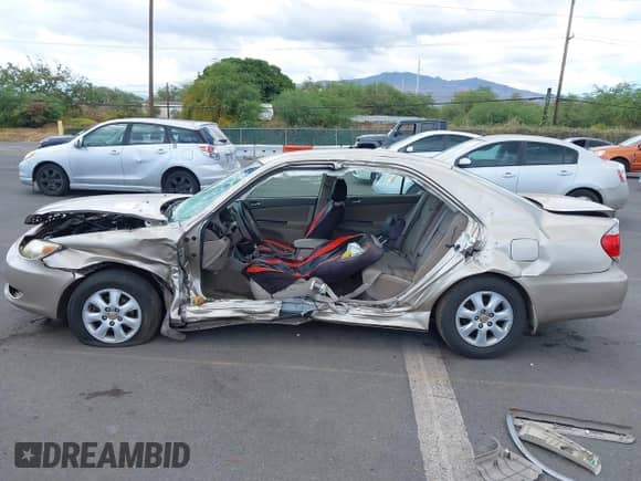 2005 Toyota Camry LE with VIN JTDBF30K150158395, listed as a IAAI auction lot 42998789 with Not provided miles and . Bid and sale history available at DreamBid. Image 14.