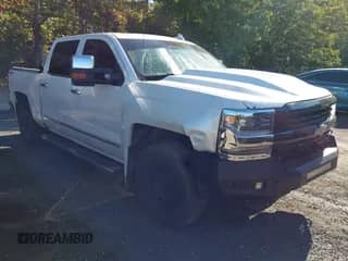 2016 Chevrolet Silverado 1500 High Country z VIN 3GCUKTEC9GG309942, wystawiony jako IAAI lot #43177199 z przebiegiem 157 166 mil mil oraz . Historia ofert i sprzedaży dostępna na DreamBid. Obrazek 1.