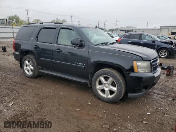 2007 Chevrolet Tahoe LS with VIN 1GNFK13067J185169, listed as a Copart auction lot 55281875 with 137,520 mi miles and Salvage title. Bid and sale history available at DreamBid. Image 4.