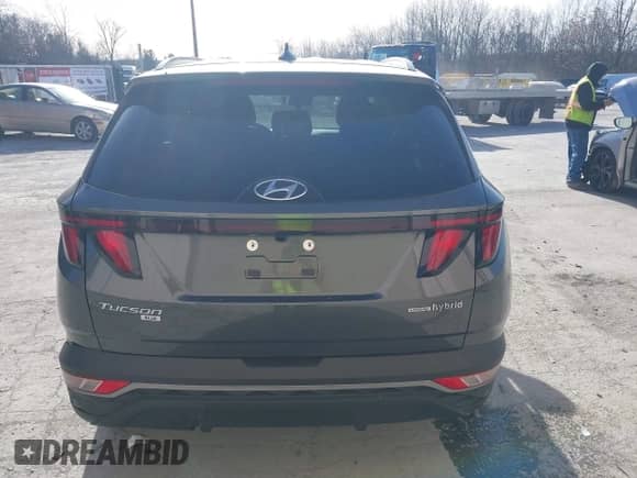 2024 Hyundai Tucson Blue with VIN KM8JBCD15RU214826, listed as a IAAI auction lot 41214421 with 7,473 mi miles and . Bid and sale history available at DreamBid. Image 16.