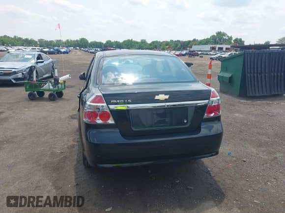 2007 Chevrolet Aveo LS with VIN KL1TD56627B055436, listed as a IAAI auction lot 42462092 with 102,923 mi miles and . Bid and sale history available at DreamBid. Image 16.