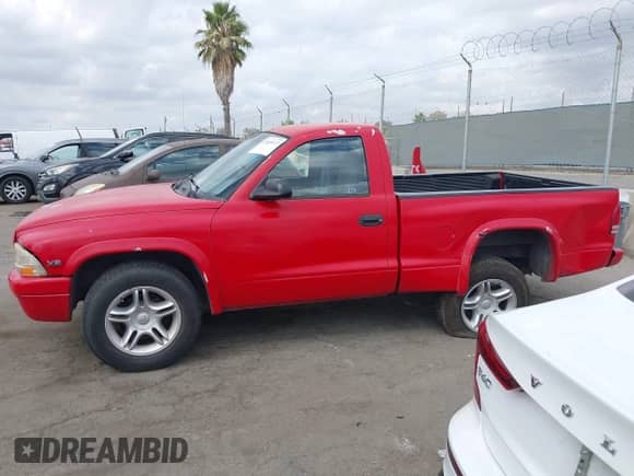 1999 Dodge Dakota SLT with VIN 1B7GL26Z5XS217114, listed as a IAAI auction lot 43418147 with 145,280 mi miles and . Bid and sale history available at DreamBid. Image 14.