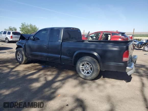 2002 Dodge Dakota SLT with VIN 1B7GL42X72S522171, listed as a Copart auction lot 58509195 with 203,069 mi miles and Salvage title. Bid and sale history available at DreamBid. Image 2.