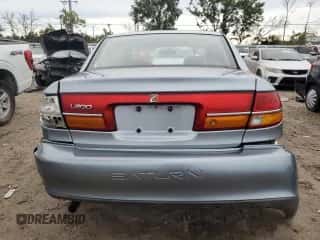 2002 Saturn LS с VIN 1G8JU54F82Y567169, выставлен на аукционе Copart как лот 73280794 с пробегом 53 894 миль миль и Списание • Salvage title. История ставок и продаж доступна на DreamBid. Изображение 6.