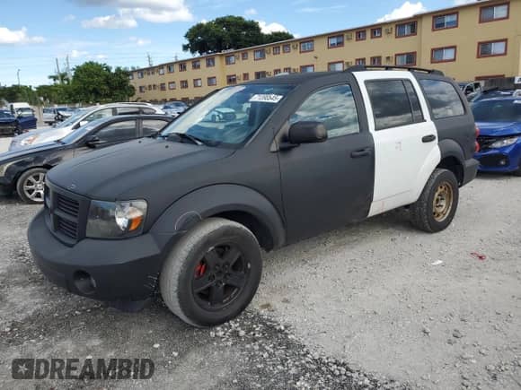 2008 Dodge Durango with VIN 1D8HD48KX8F109516, listed as a Copart auction lot 71398545 with 178,256 mi miles and Salvage title. Bid and sale history available at DreamBid. Image 1.
