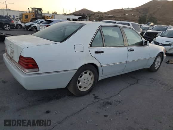 1992 Mercedes-Benz 500 с VIN WDBGA51E1NA048741, выставлен на аукционе Copart как лот 85514514 с пробегом 145 361 миль миль и Чистый • Clean title. История ставок и продаж доступна на DreamBid. Изображение 3.