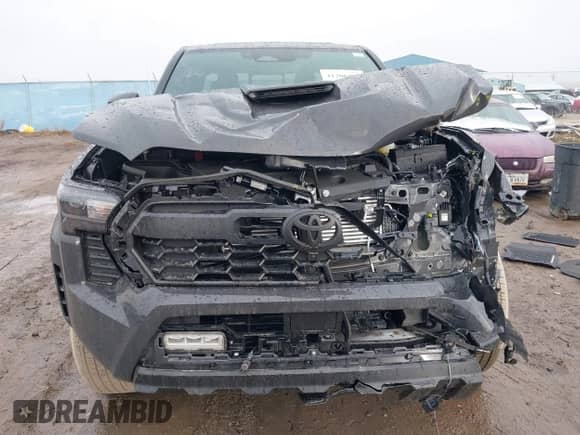 2024 Toyota Tacoma SR5 with VIN 3TMLB5JNXRM055645, listed as a IAAI auction lot 41208771 with 984 mi miles and . Bid and sale history available at DreamBid. Image 13.