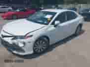 2022 Toyota Camry Hybrid LE with VIN 4T1C31AK2NU591549, listed as a IAAI auction lot 42499072 with 55,882 mi miles and . Bid and sale history available at DreamBid. Image 2.