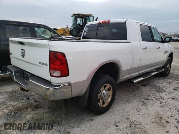 2012 Dodge RAM with VIN 3C6TD5NT9CG213344, listed as a Copart auction lot 79012504 with Not provided miles and Salvage title. Bid and sale history available at DreamBid. Image 3.