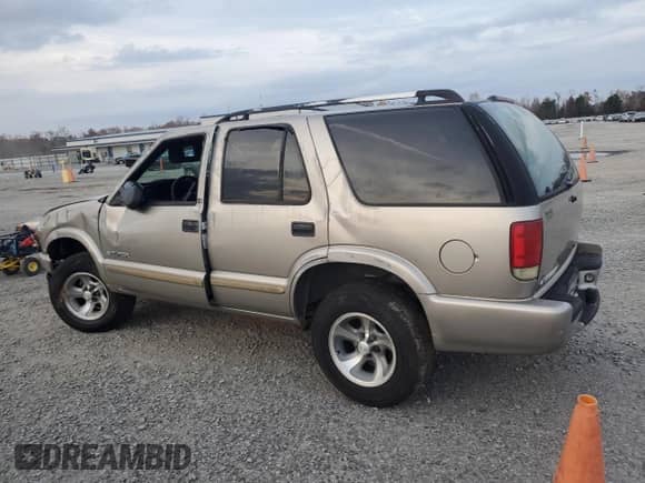 2003 Chevrolet Blazer LS с VIN 1GNCS13X53K148585, выставлен на аукционе Copart как лот 82339174 с пробегом 262 249 миль миль и Списание • Salvage title. История ставок и продаж доступна на DreamBid. Изображение 2.