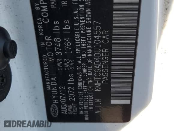 2013 Hyundai Veloster w/Gray Int z VIN KMHTC6AD4DU104557, wystawiony jako Copart lot #86129525 z przebiegiem 109 991 mil mil oraz Szkoda całkowita • Salvage title. Historia ofert i sprzedaży dostępna na DreamBid. Obrazek 12.