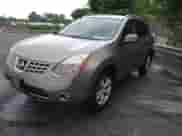 2009 Nissan Rogue S with VIN JN8AS58T59W322738, listed as a IAAI auction lot 42260288 with 88,152 mi miles and . Bid and sale history available at DreamBid. Image 2.