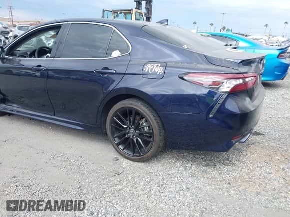 2022 Toyota Camry Hybrid XSE с VIN 4T1K31AK6NU571803, выставлен на аукционе IAAI как лот 42348549 с пробегом 15 263 миль миль и . История ставок и продаж доступна на DreamBid. Изображение 3.