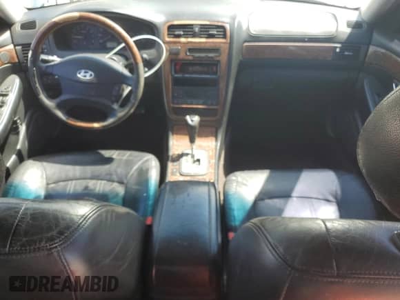 2004 Hyundai XG with VIN KMHFU45E44A364184, listed as a Copart auction lot 52689345 with 154,377 mi miles and Salvage title. Bid and sale history available at DreamBid. Image 8.