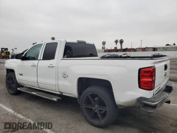 2016 Chevrolet Silverado 1500 LT with VIN 1GCRCREH5GZ180454, listed as a Copart auction lot 55177435 with 183,657 mi miles and Salvage title. Bid and sale history available at DreamBid. Image 2.
