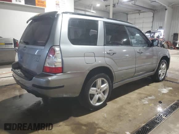2007 Subaru Forester Special Sports XT z VIN JF1SG696X7H725959, wystawiony jako Copart lot #86597334 z przebiegiem 56 997 mil mil oraz Szkoda całkowita • Salvage title. Historia ofert i sprzedaży dostępna na DreamBid. Obrazek 3.