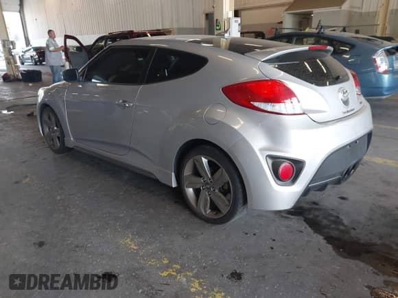 2013 Hyundai Veloster Turbo с VIN KMHTC6AEXDU145719, выставлен на аукционе IAAI как лот 43144474 с пробегом 51 191 миль миль и . История ставок и продаж доступна на DreamBid. Изображение 3.