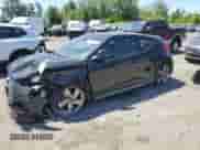 2014 Hyundai Veloster Turbo R-Spec с VIN KMHTC6AE0EU191187, выставлен на аукционе Copart как лот 65017625 с пробегом 134 079 миль миль и Списание • Salvage title. История ставок и продаж доступна на DreamBid. Изображение 1.