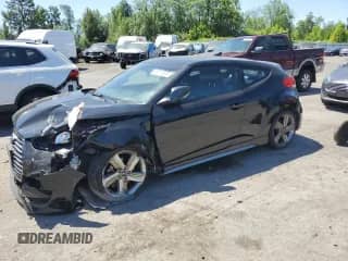 2014 Hyundai Veloster Turbo R-Spec с VIN KMHTC6AE0EU191187, выставлен на аукционе Copart как лот 65017625 с пробегом 134 079 миль миль и Списание • Salvage title. История ставок и продаж доступна на DreamBid. Изображение 1.