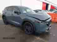2023 Mazda CX-5 S Carbon Edition z VIN JM3KFBCM2P0212062, wystawiony jako IAAI lot #40853928 z przebiegiem 25 463 mil mil oraz . Historia ofert i sprzedaży dostępna na DreamBid. Obrazek 1.