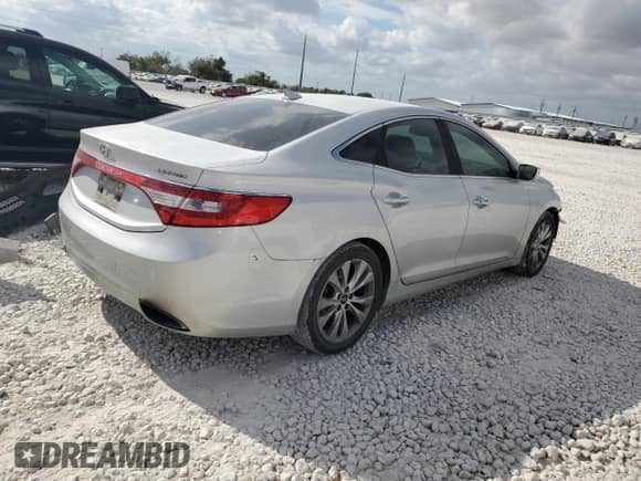 2014 Hyundai Azera Limited с VIN KMHFH4JG9EA396464, выставлен на аукционе Copart как лот 78434104 с пробегом 202 082 миль миль и Списание • Salvage title. История ставок и продаж доступна на DreamBid. Изображение 3.