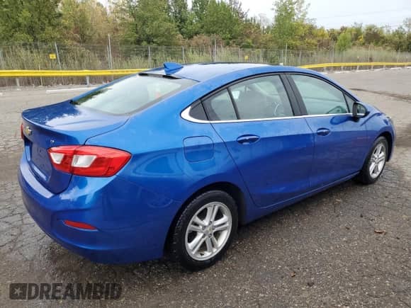 2017 Chevrolet Cruze LT with VIN 1G1BE5SM1H7126127, listed as a Copart auction lot 83778305 with 114,370 mi miles and Clean title. Bid and sale history available at DreamBid. Image 3.