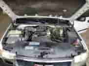 2002 GMC Sierra 1500 z VIN 1GTEC14W22Z149901, wystawiony jako Copart lot #60996325 z przebiegiem 243 259 mil mil oraz Czysty tytuł • Clean title. Historia ofert i sprzedaży dostępna na DreamBid. Obrazek 11.