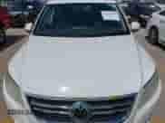 2011 Volkswagen Tiguan SE with VIN WVGAV7AX6BW557338, listed as a IAAI auction lot 42726724 with 175,004 mi miles and . Bid and sale history available at DreamBid. Image 6.