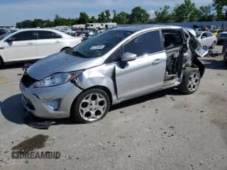 2011 Ford Fiesta SES with VIN 3FADP4FJ5BM200284, listed as a Copart auction lot 57276395 with 161,849 mi miles and Salvage title. Bid and sale history available at DreamBid. Image 1.