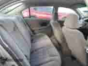 2000 Chevrolet Malibu LS z VIN 1G1NE52J7Y6310349, wystawiony jako Copart lot #76175864 z przebiegiem 132 021 mil mil oraz Szkoda całkowita • Salvage title. Historia ofert i sprzedaży dostępna na DreamBid. Obrazek 10.