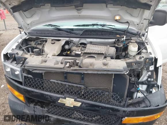 2018 Chevrolet Express Cargo z VIN 1GCWGBFG4J1326904, wystawiony jako IAAI lot #41969074 z przebiegiem 74 710 mil mil oraz . Historia ofert i sprzedaży dostępna na DreamBid. Obrazek 10.