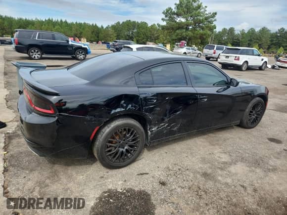 2015 Dodge Charger SE с VIN 2C3CDXBG7FH867229, выставлен на аукционе Copart как лот 82050975 с пробегом 161 972 миль миль и Списание • Salvage title. История ставок и продаж доступна на DreamBid. Изображение 3.