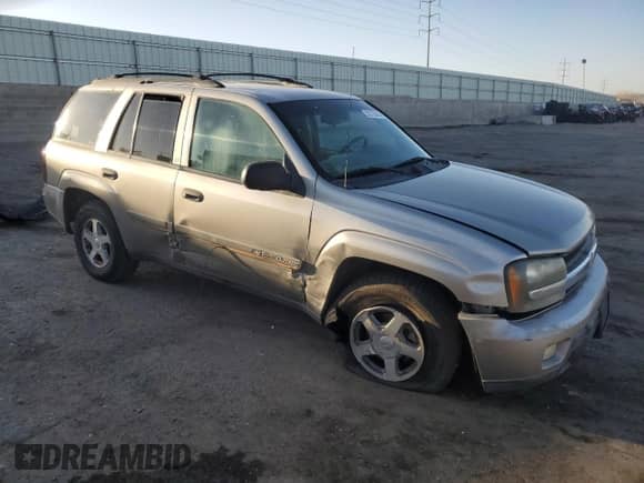 2002 Chevrolet TrailBlazer LTZ with VIN 1GNDS13S722179733, listed as a Copart auction lot 52723555 with 164,437 mi miles and Salvage title. Bid and sale history available at DreamBid. Image 4.