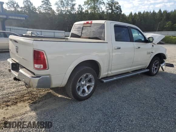 2018 Ram 1500 Laramie с VIN 1C6RR6NT8JS106115, выставлен на аукционе Copart как лот 69843535 с пробегом 134 925 миль миль и Списание • Salvage title. История ставок и продаж доступна на DreamBid. Изображение 3.