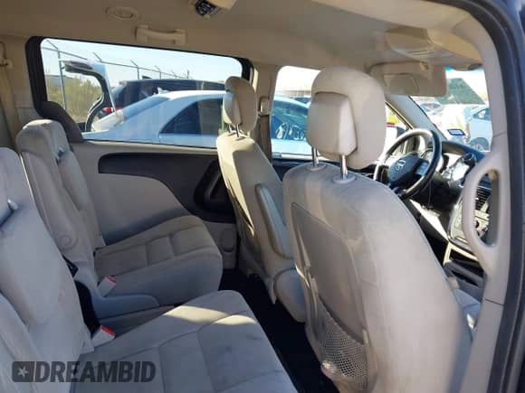 2014 Dodge Grand Caravan American Value with VIN 2C4RDGBGXER451433, listed as a IAAI auction lot 42682156 with 273,976 mi miles and . Bid and sale history available at DreamBid. Image 8.