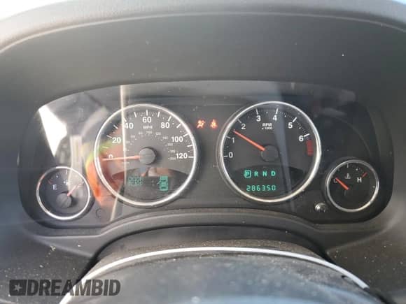 2012 Jeep Compass Limited z VIN 1C4NJCCB7CD515382, wystawiony jako Copart lot #45980405 z przebiegiem 286 350 mil mil oraz Szkoda całkowita • Salvage title. Historia ofert i sprzedaży dostępna na DreamBid. Obrazek 9.