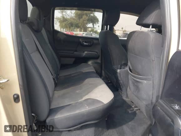 2020 Toyota Tacoma SR5 z VIN 3TMBZ5DN5LM026533, wystawiony jako IAAI lot #41529069 z przebiegiem 87 710 mil mil oraz . Historia ofert i sprzedaży dostępna na DreamBid. Obrazek 8.