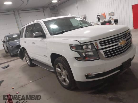 2018 Chevrolet Tahoe Premier z VIN 1GNSKCKC1JR249293, wystawiony jako IAAI lot #42237526 z przebiegiem 126 302 mil mil oraz . Historia ofert i sprzedaży dostępna na DreamBid. Obrazek 1.
