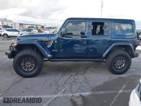2024 Jeep Wrangler Rubicon 392 with VIN 1C4RJXSJ5RW369532, listed as a IAAI auction lot 41755964 with 1,742 mi miles and . Bid and sale history available at DreamBid. Image 14.