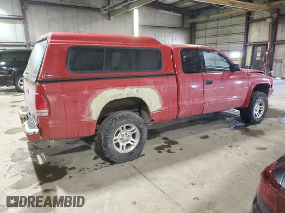 2002 Dodge Dakota Sport с VIN 1B7GG32N12S722007, выставлен на аукционе Copart как лот 45206695 с пробегом 107 940 миль миль и Списание • Salvage title. История ставок и продаж доступна на DreamBid. Изображение 3.