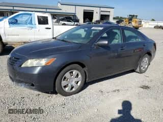 2007 Toyota Camry XLE z VIN 4T1BE46K17U679236, wystawiony jako Copart lot #86596175 z przebiegiem 260 775 mil mil oraz Czysty tytuł • Clean title. Historia ofert i sprzedaży dostępna na DreamBid. Obrazek 1.