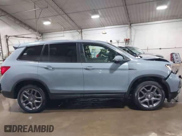 2022 Honda Passport EX-L с VIN 5FNYF8H57NB000358, выставлен на аукционе IAAI как лот 41607708 с пробегом 68 477 миль миль и . История ставок и продаж доступна на DreamBid. Изображение 13.
