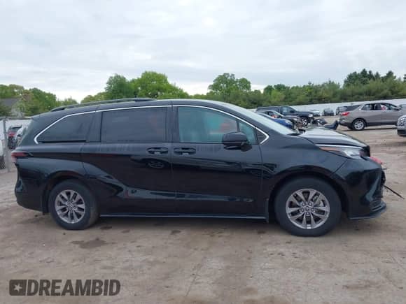 2023 Toyota Sienna LE with VIN 5TDKSKFC2PS084975, listed as a IAAI auction lot 42334415 with 30,886 mi miles and . Bid and sale history available at DreamBid. Image 12.