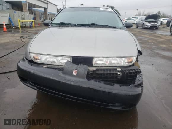 1996 Saturn SL с VIN 1G8ZK5272TZ265571, выставлен на аукционе Copart как лот 51267475 с пробегом 142 824 миль миль и Списание • Salvage title. История ставок и продаж доступна на DreamBid. Изображение 5.