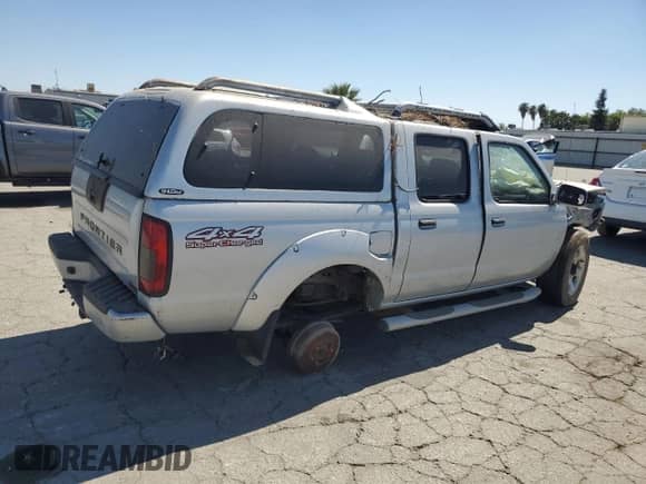 2001 Nissan Frontier SC SuperCharger with VIN 1N6MD27Y61C389396, listed as a Copart auction lot 67128365 with 64,710 mi miles and Clean title. Bid and sale history available at DreamBid. Image 3.