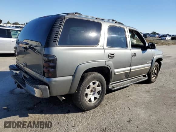 2002 Chevrolet Tahoe LT with VIN 1GNEC13Z92R154547, listed as a Copart auction lot 86888945 with 227,015 mi miles and Salvage title. Bid and sale history available at DreamBid. Image 3.