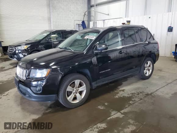 2014 Jeep Compass Sport with VIN 1C4NJDBB9ED842554, listed as a Copart auction lot 69468485 with 124,308 mi miles and Salvage title. Bid and sale history available at DreamBid. Image 1.
