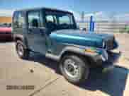 1995 Jeep Wrangler S with VIN 1J4FY19P4SP263783, listed as a Copart auction lot 69754055 with 176,518 mi miles and Salvage title. Bid and sale history available at DreamBid. Image 4.