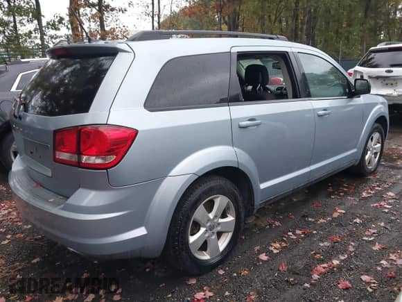 2013 Dodge Journey American Value с VIN 3C4PDCAB7DT587567, выставлен на аукционе IAAI как лот 43556039 с пробегом 132 943 миль миль и . История ставок и продаж доступна на DreamBid. Изображение 4.